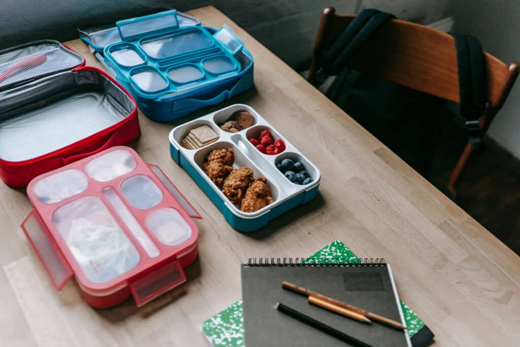 Alameda Post - a lunch box on a table next to school supplies