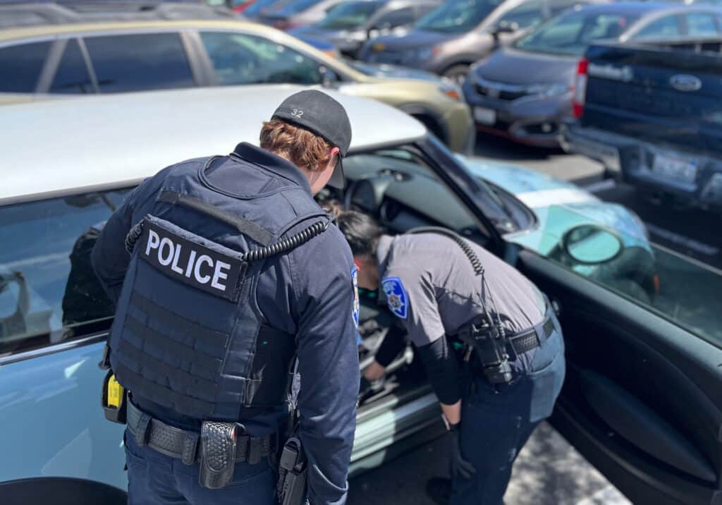Alameda Post - APD officers search a car