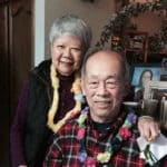 Alameda Post - an older couple poses and smiles at the camera