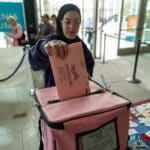 Alameda Post - Doonya Mahmoud casts her ballot at a polling site at the Calfornia Museum in Sacramento on Nov. 5, 2024. Photo by Miguel Gutierrez Jr., CalMatters