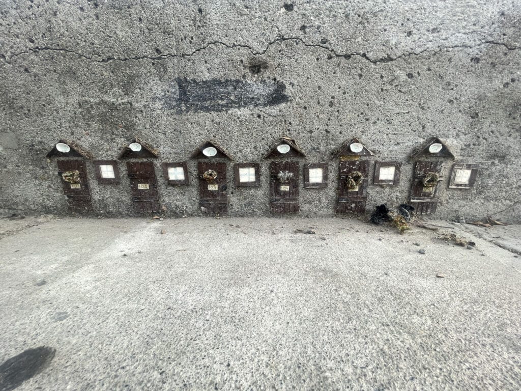 Alameda Post - tiny fairy doors with holiday wreaths