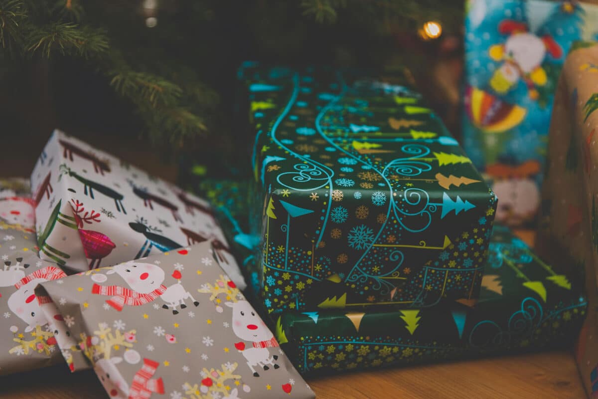 Alameda Post - a wrapped package of a shoe box size under a tree