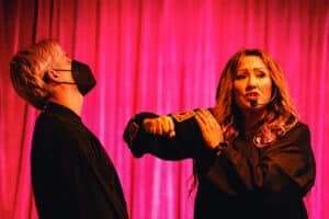 Alameda Post - two people demonstrate a self defense move