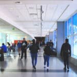 Alameda Post - passengers walk inside OAK
