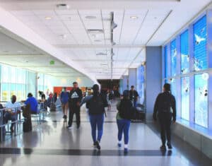 Alameda Post - passengers walk inside OAK