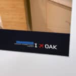 Alameda Post - a sign at the OAK airport that was newly created saying "San Francisco Bay Oakland International Airport." Blue tape is now covering the "San Fransisco Bay" portion