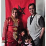 Alameda Post - a family of four smile at the camera