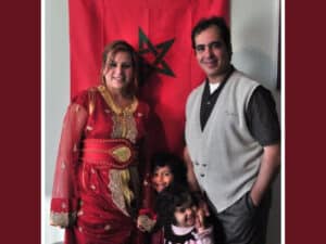 Alameda Post - a family of four smile at the camera