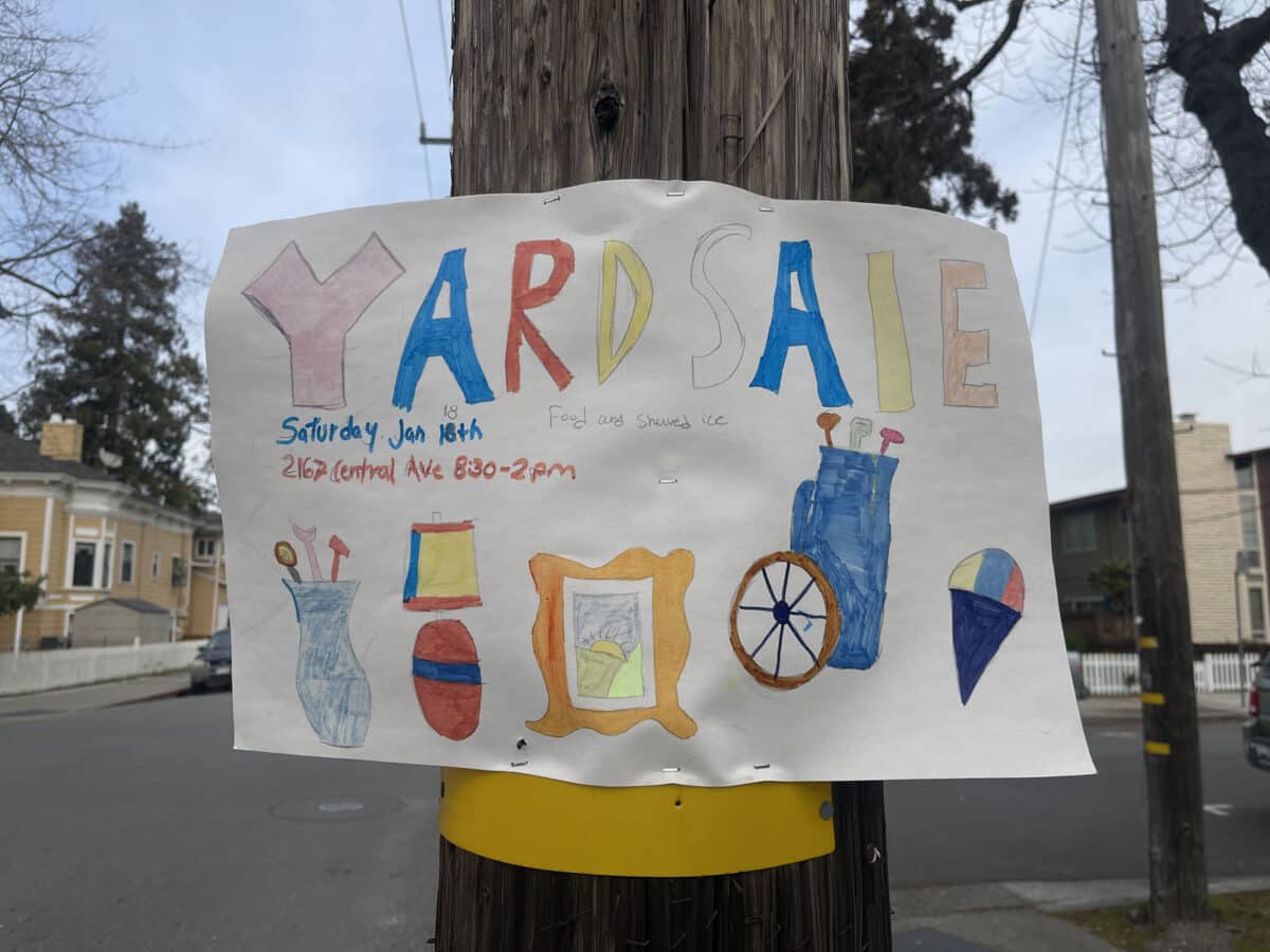 Alameda Post - a hand drawn yard sale sign with simple drawings of household items