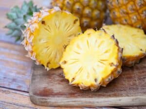 Alameda Post - a cut up pineapple on a cutting board