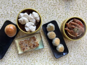 Alameda Post - various dim sum on small plates at a restaurant table