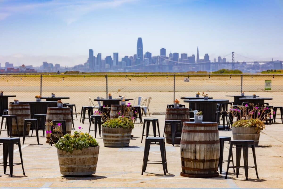 Alameda Post - the outdoor seating area at Faction Brewing which overlooks the Bay and the SF skyline