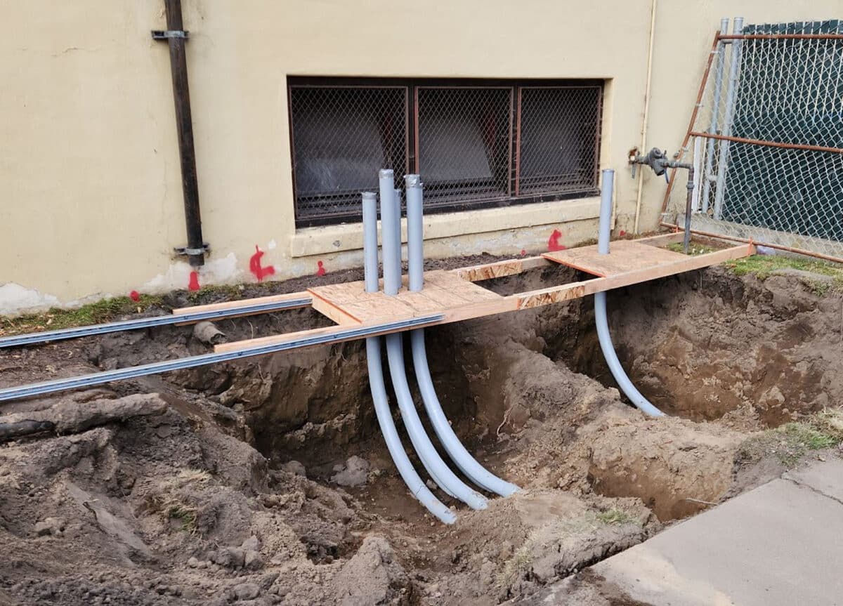Alameda Post - a construction site with exposed HVAC equipment