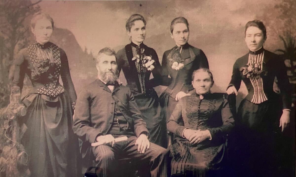 Alameda Post - an old black and white photo of six adults, including 4 grown or nearly grown children, in the Rich Family