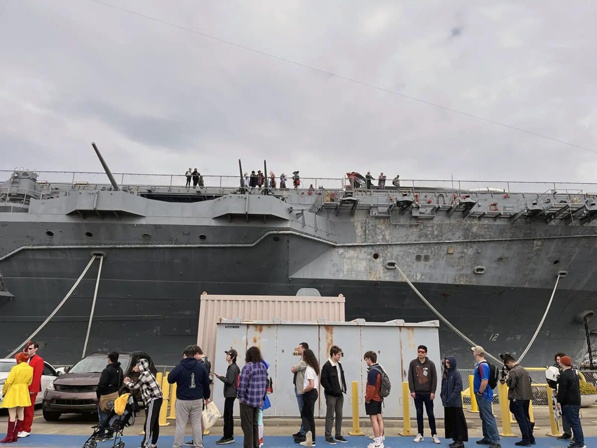 Alameda Post - 2025 Carrier Con attendees lined up outside the USS Hornet waiting to enter.