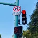 Alameda Post - a red light at Park and Otis, and a sign that says no right turn on red