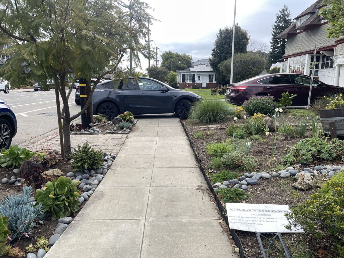 Alameda Post - a car in someone's driveway that is completely blocking the sidewalk