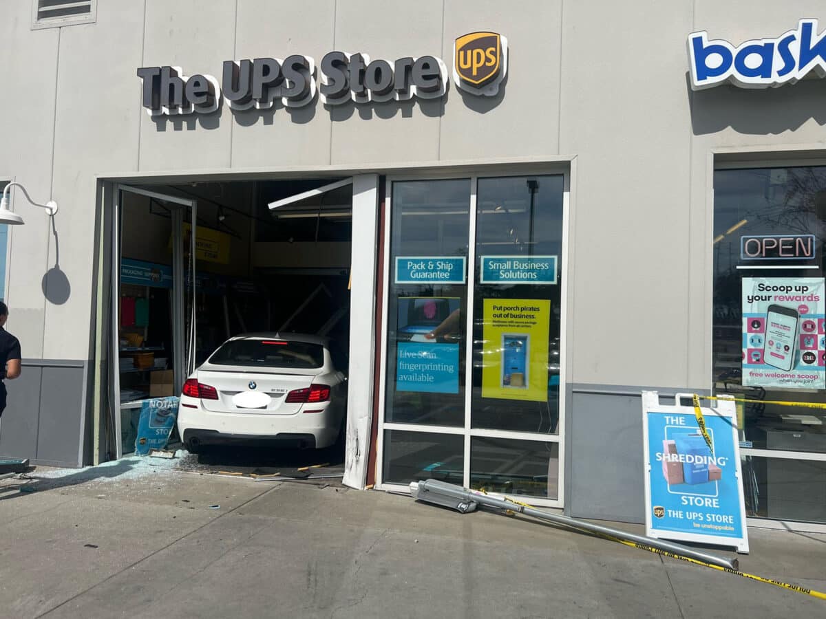 Alameda Post - a car through the front of a UPS store