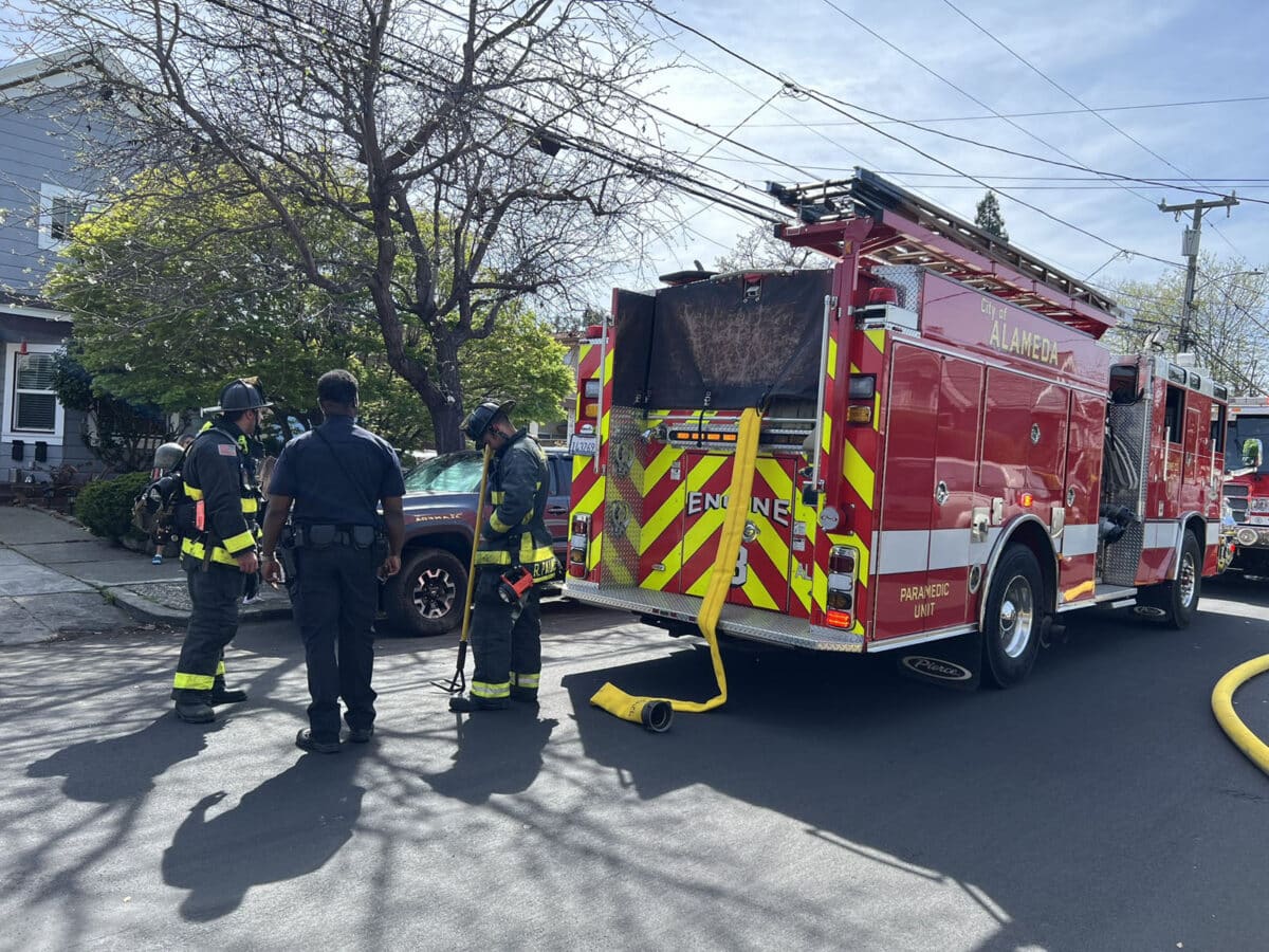 Alameda Post - an AFD truck and firefighters on an Alameda street during the daytime
