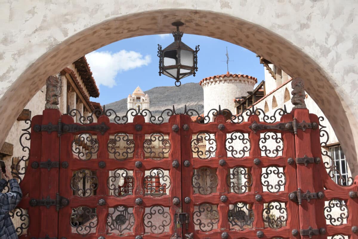 Alameda Post - an elaborate fence and archway leading to a courtyard