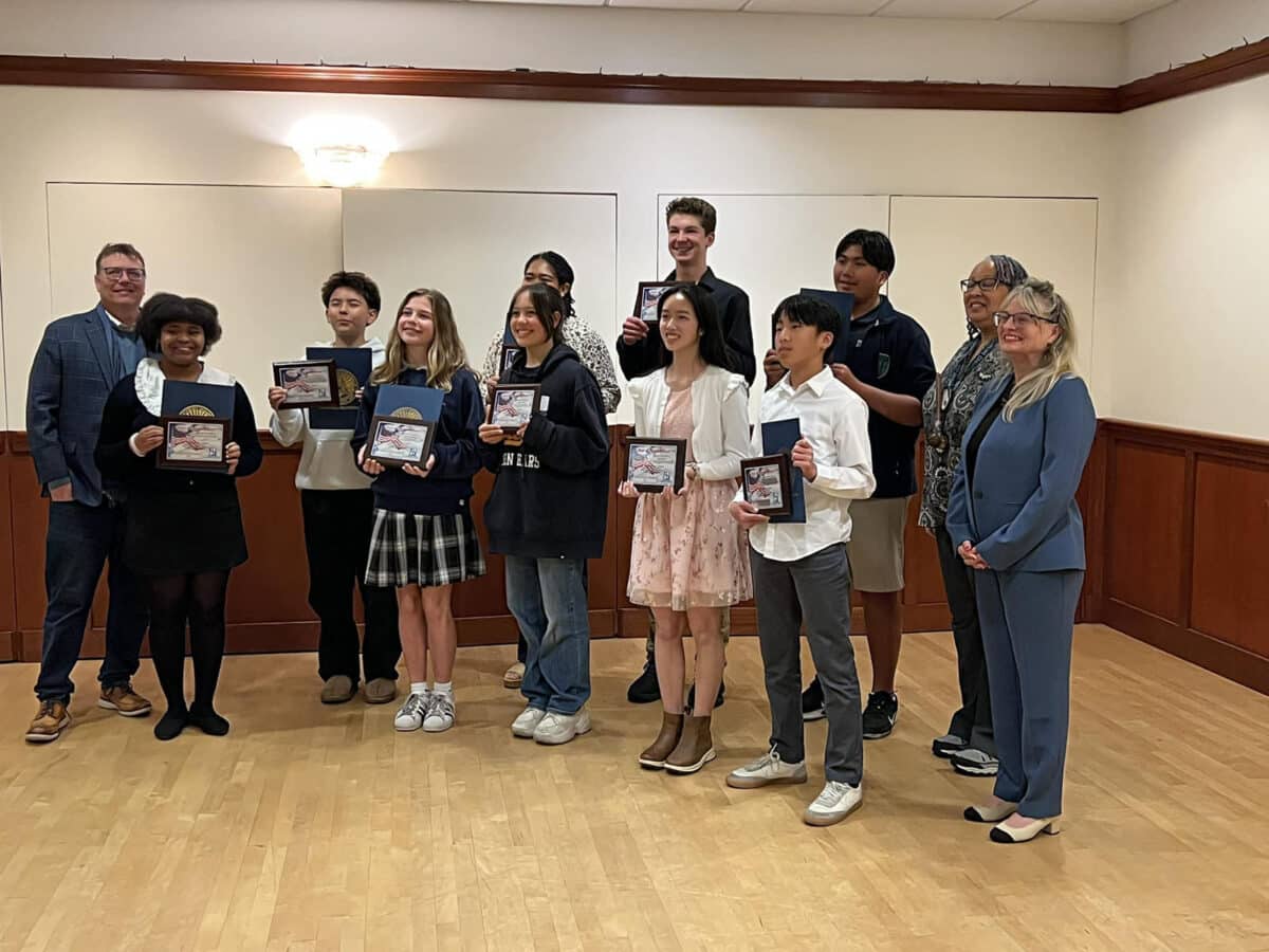 Alameda Post - a group photo of Hope of America award winners and some adults