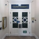 Alameda Post - the doors to the Alameda City Council meeting chamber