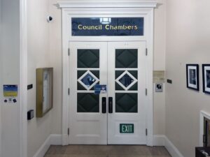 Alameda Post - the doors to the Alameda City Council meeting chamber