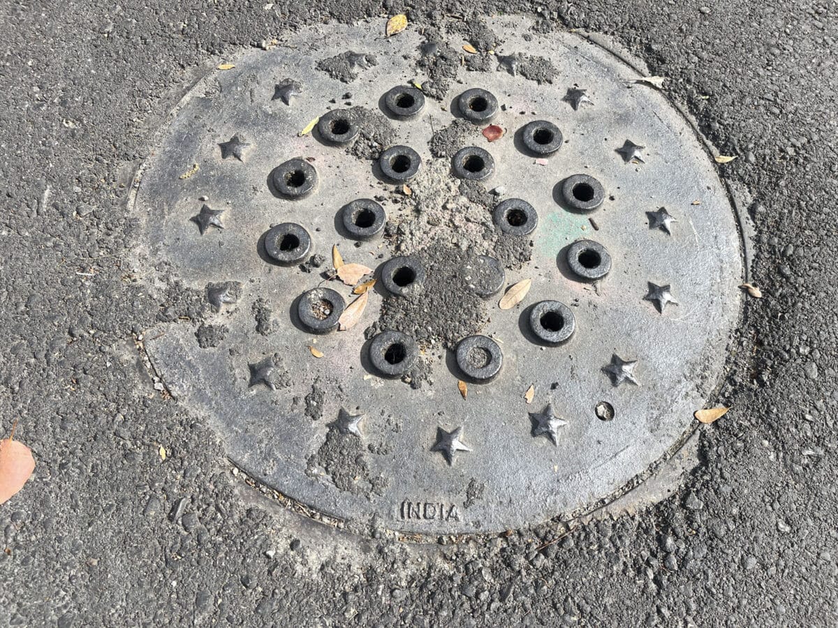 Alameda Post - a man hole cover