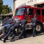 Alameda Post - AFD Alameda firefighters push their new truck 1 into the station