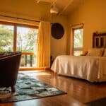 Alameda Post - a nicely made up room that looks like a hotel or other short term rental