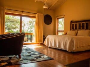 Alameda Post - a nicely made up room that looks like a hotel or other short term rental