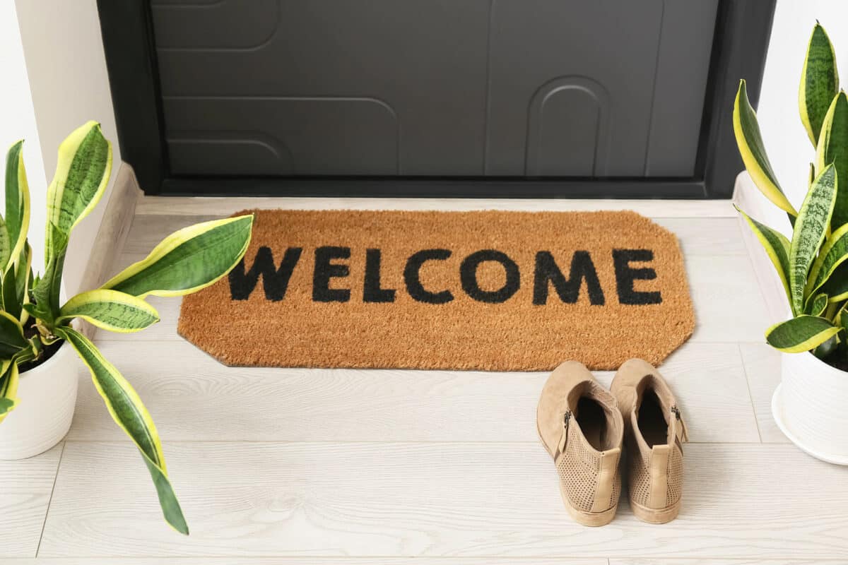 Alameda Post - a welcome mat in front of a home