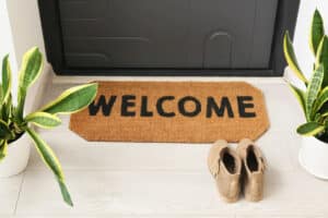 Alameda Post - a welcome mat in front of a home