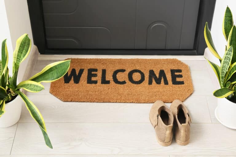 Alameda Post - a welcome mat in front of a home