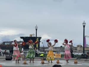 Alameda Post - four performers in bright clothing perform at the Asian & Pacific Islander Arts & Culture Festival