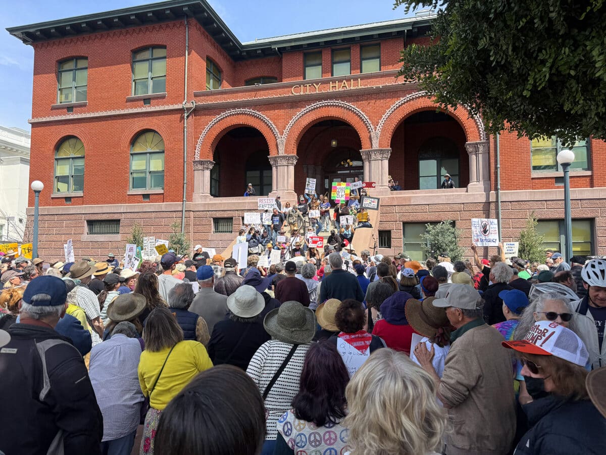 Protesters gather in front of Alameda City Hall on April 5, 2025 Hands Off Rally in Alameda, CA. Photo Adam Gillitt.