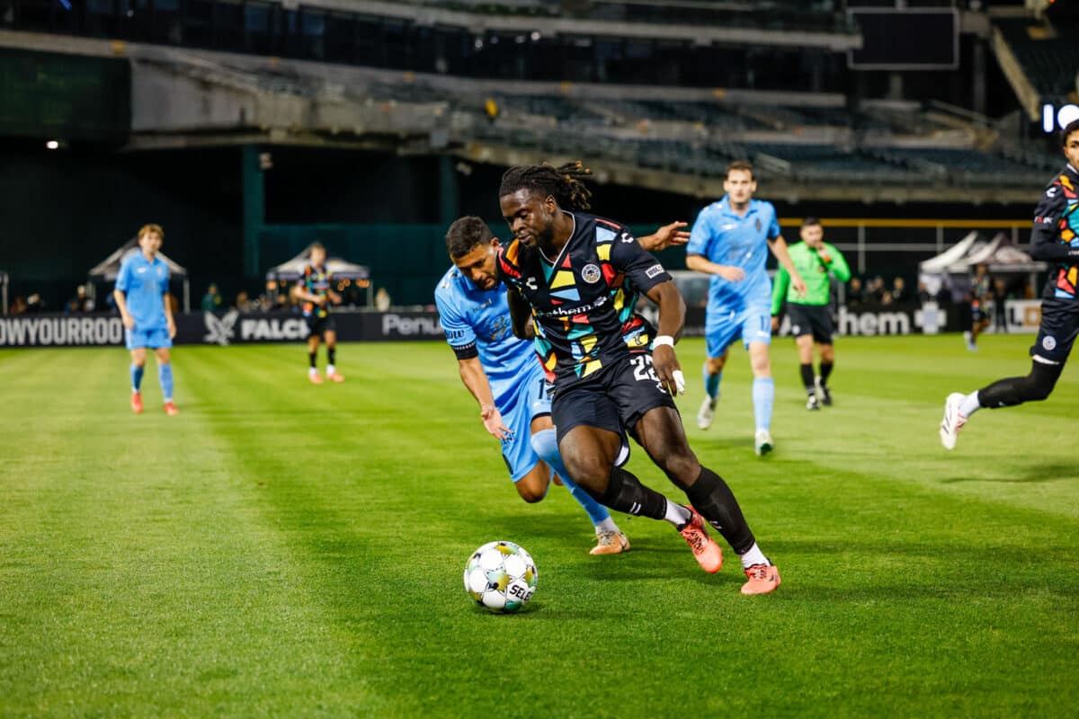 Alameda Post - an Oakland Roots player controls the ball in a match against Las Vegas Lights