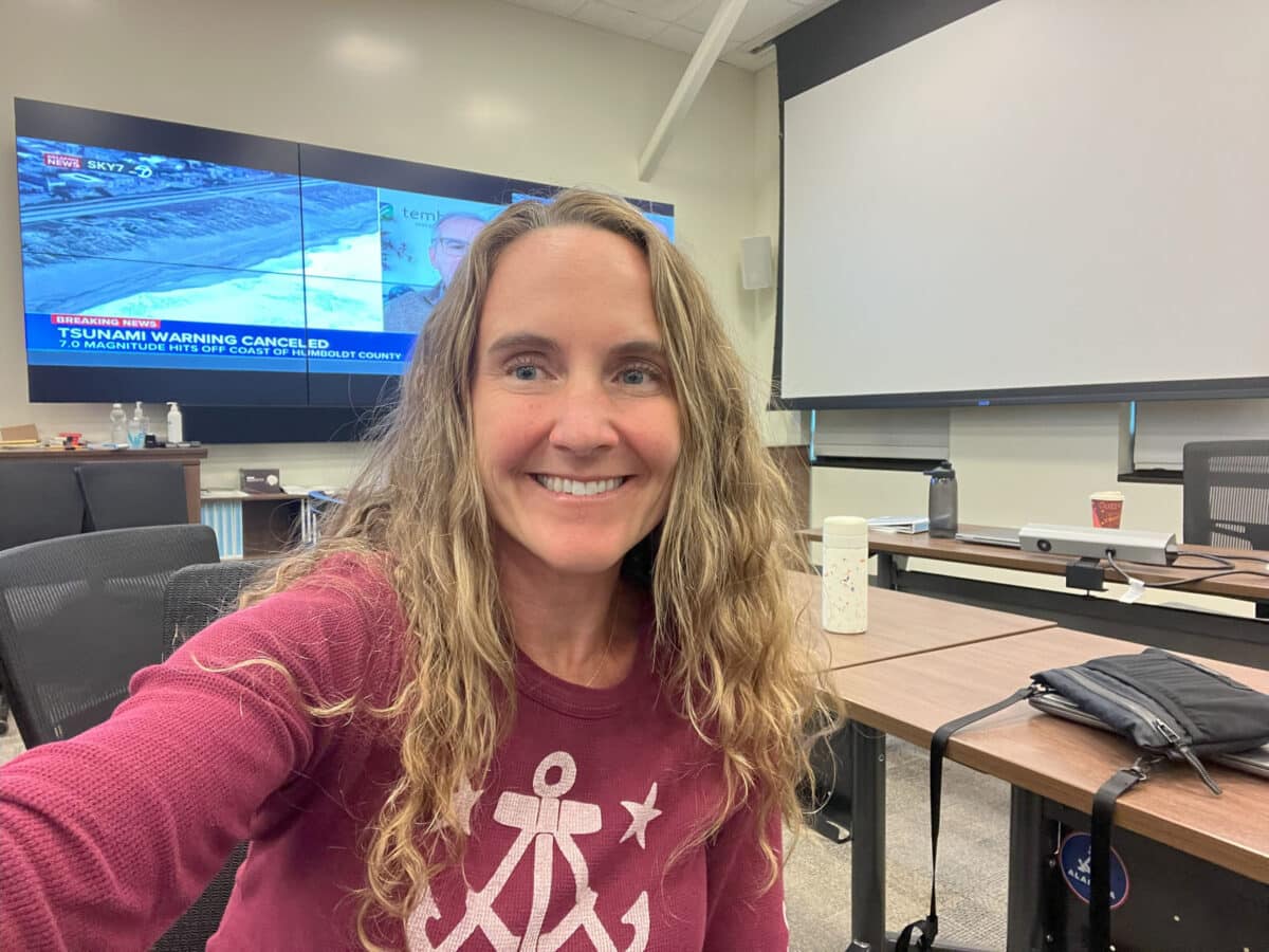 Alameda Post - a woman takes a selfie in a government room