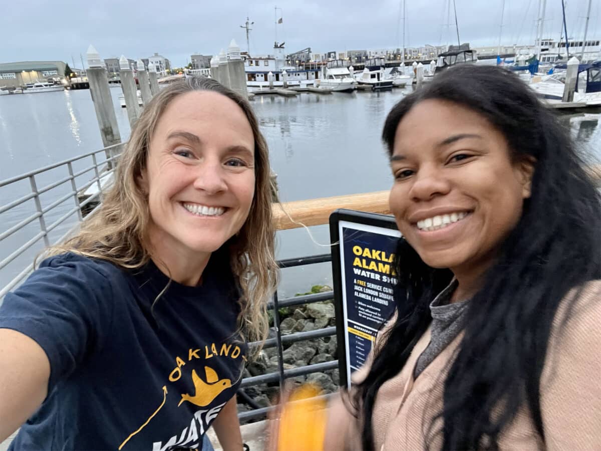 Alameda Post - two women take a selfie by the dock for Woodstock the Water Shuttle