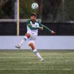 Alameda Post - an Oakland Roots player kicks the ball in the match against Tacoma Defiance