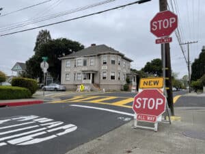 Alameda Post - the intersection of Willow Street and Pacific Avenue with new four way stop signs