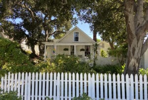 Alameda Post - a yellow cottage at 1620 Fourth Street with a white picket fence