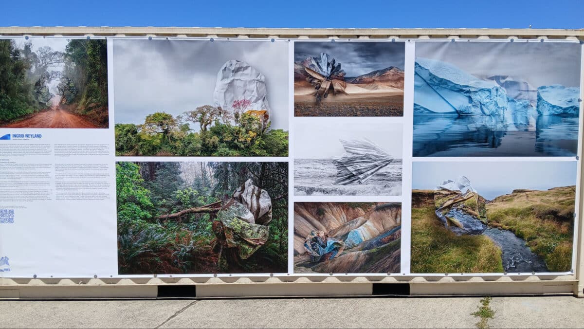 Alameda Post - photographs of landscapes displayed on the side of a shipping container at FOCUS Fest. They include icebergs, rivers, forests, and deserts