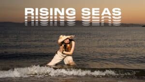 Alameda Post - the poster for the Rising Seas events, which includes a photo of a dancer in the water at a beach