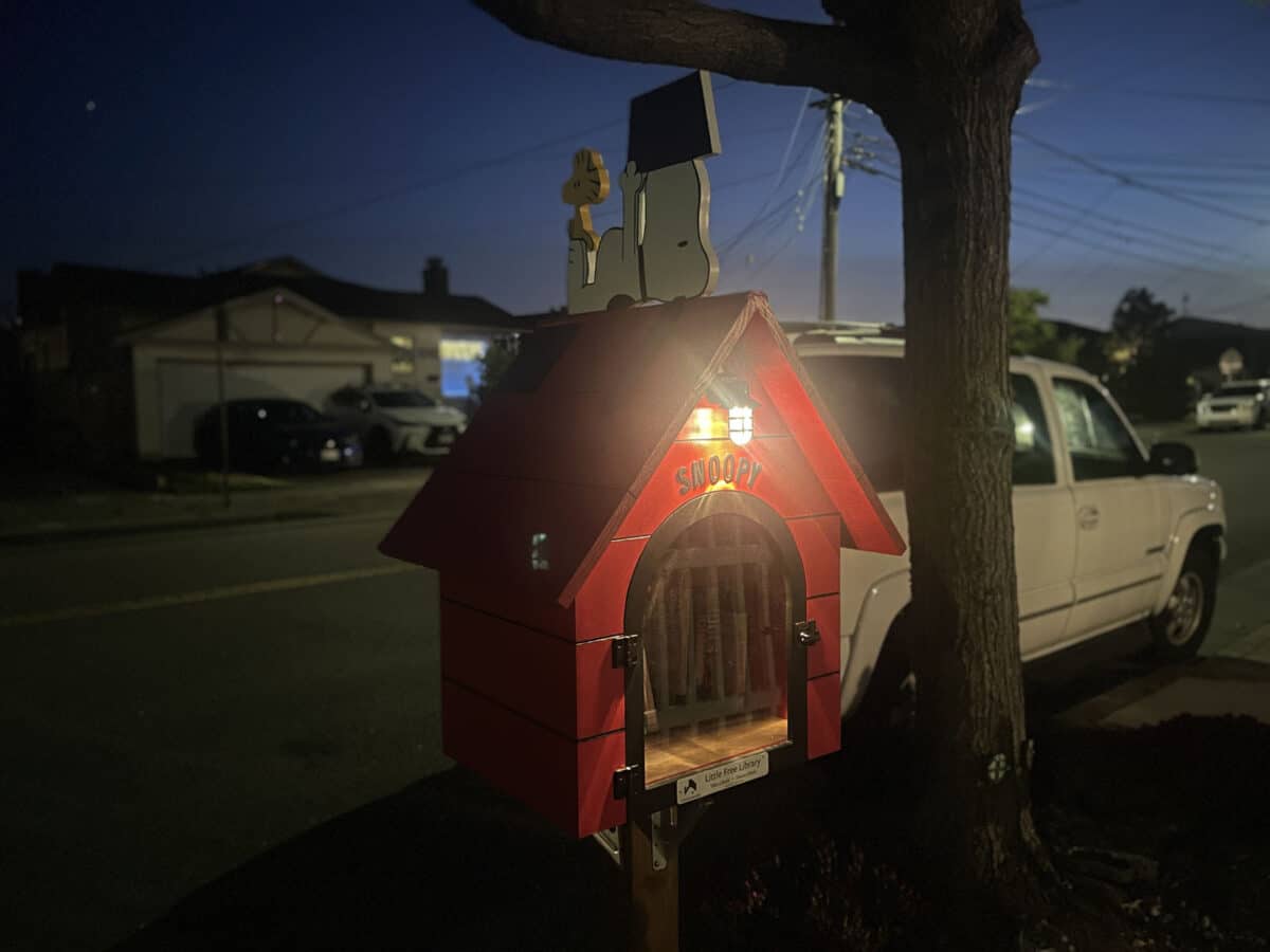 Alameda Post - a little library that looks like snoopy's dog house