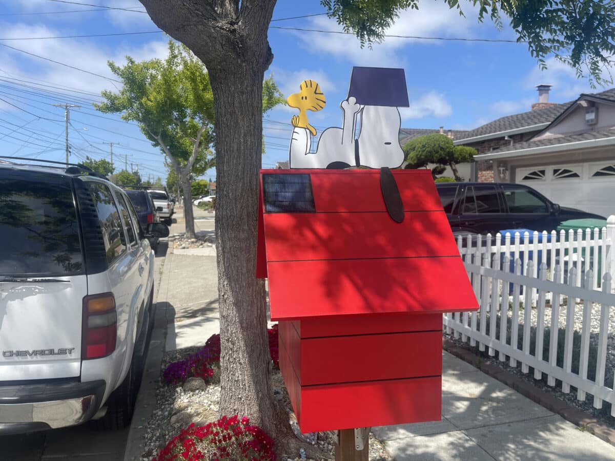 Alameda Post - a little library that looks like snoopy's dog house