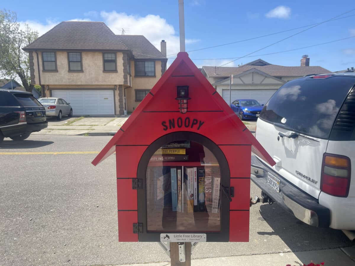 Alameda Post - a little library that looks like snoopy's dog house