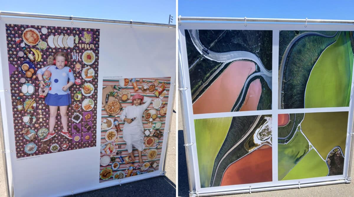 Alameda Post - photo graphs on display at FOCUS Fest. In one photograph display, children lay down surrounded by all the food they eat. In another photo collage, we see colorful landscape photos of salt flats.