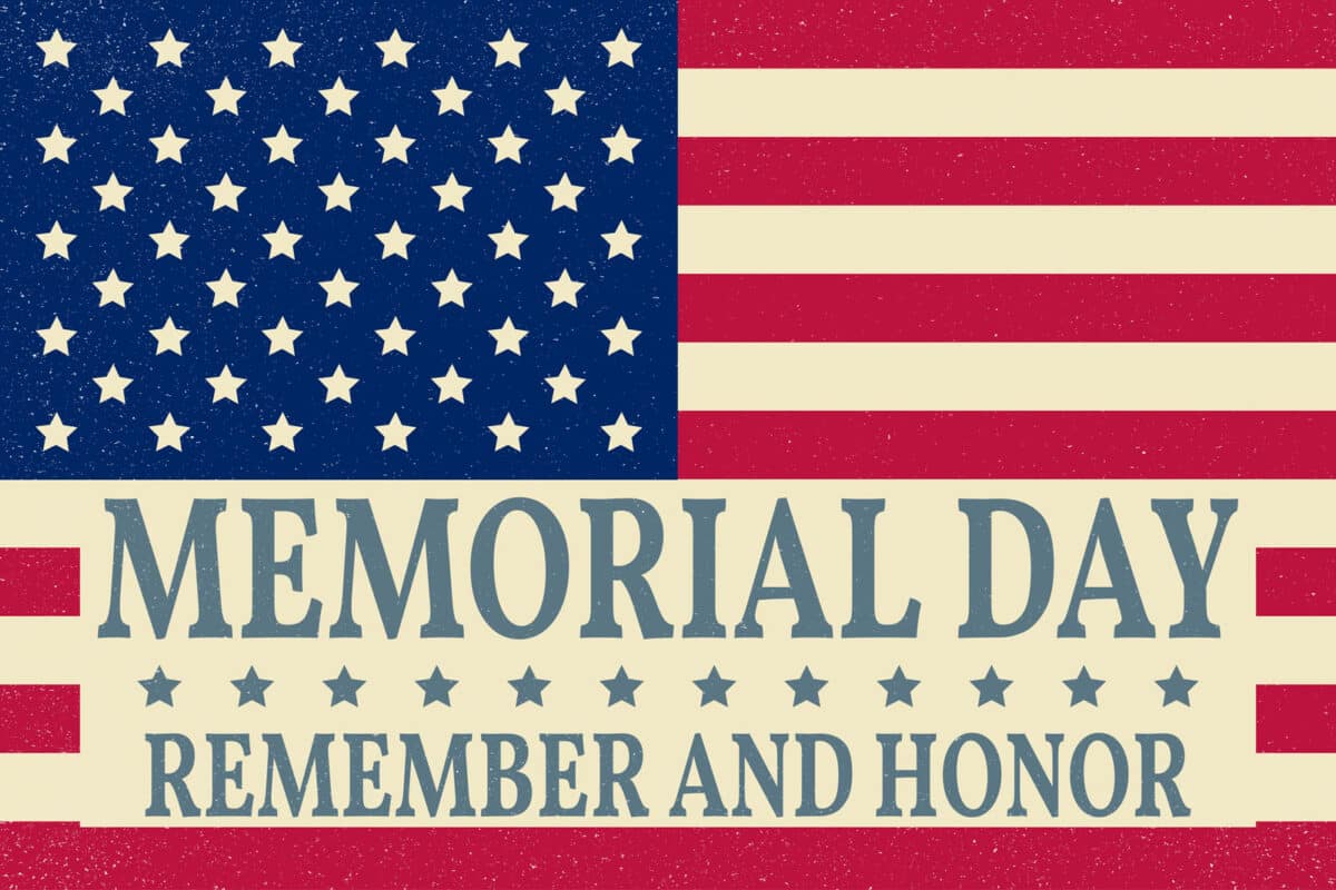 Alameda Post - an American flag with the text 'Memorial Day Remember and Honor' on top of it