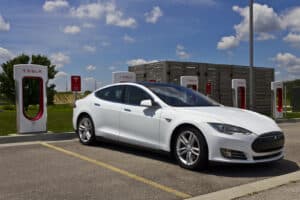 Alameda Post - a tesla plugged into a charging station